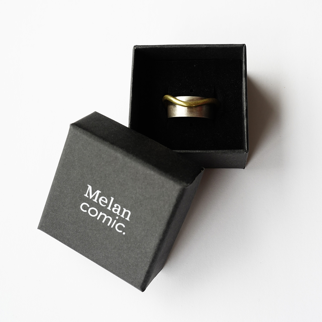 Melancomic Ring